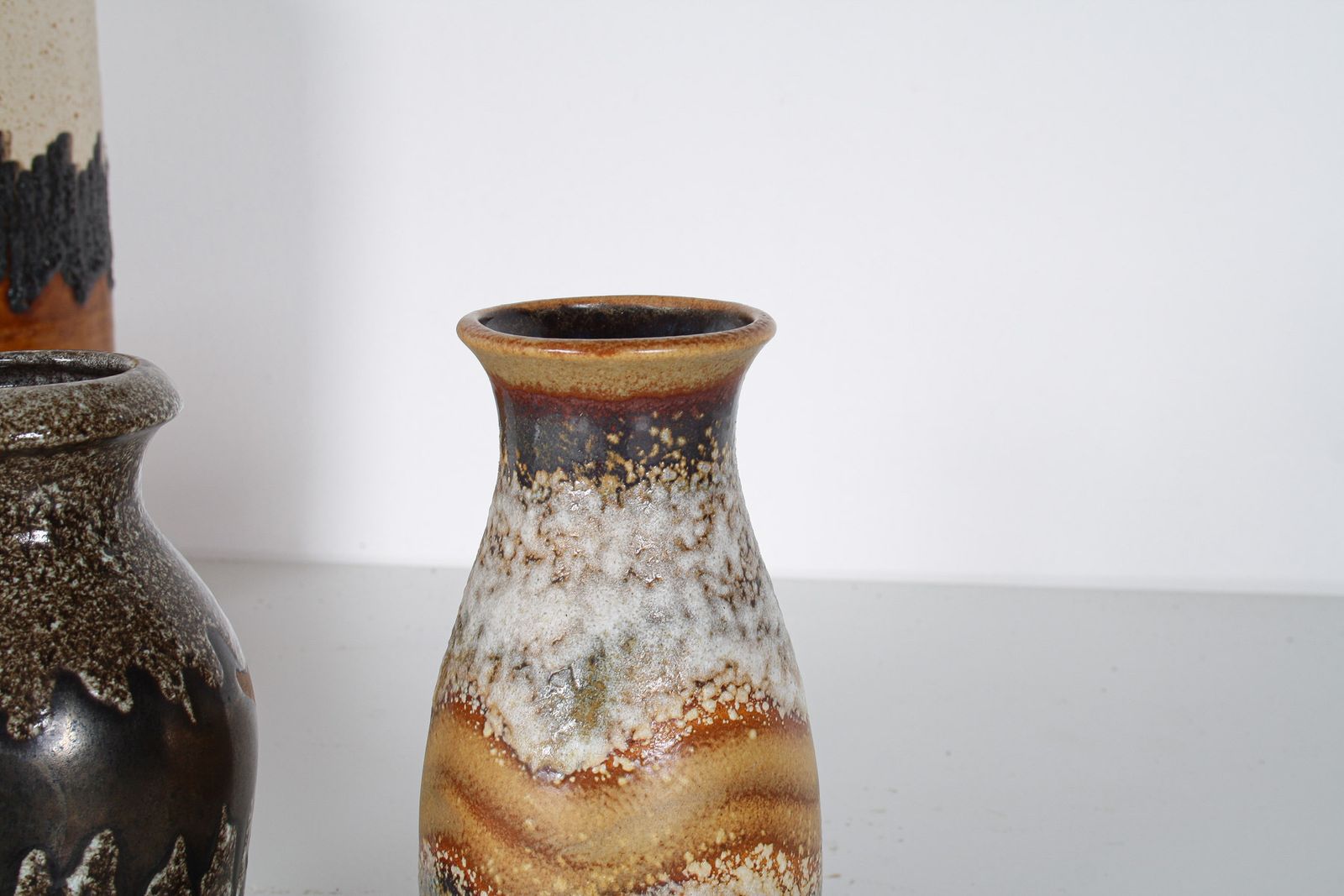 A Pair Of West German Pottery Lava Vases In Earthy Vibrant Tones photo vintage
