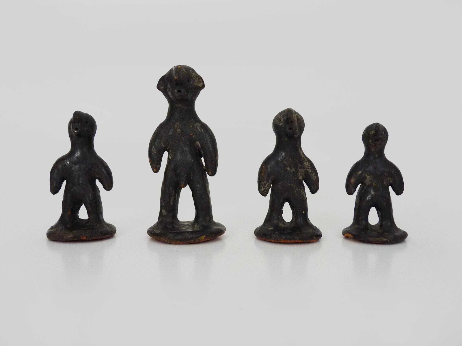 Set Of 4 Brutalist African Style Terracotta Sculptures. 60s