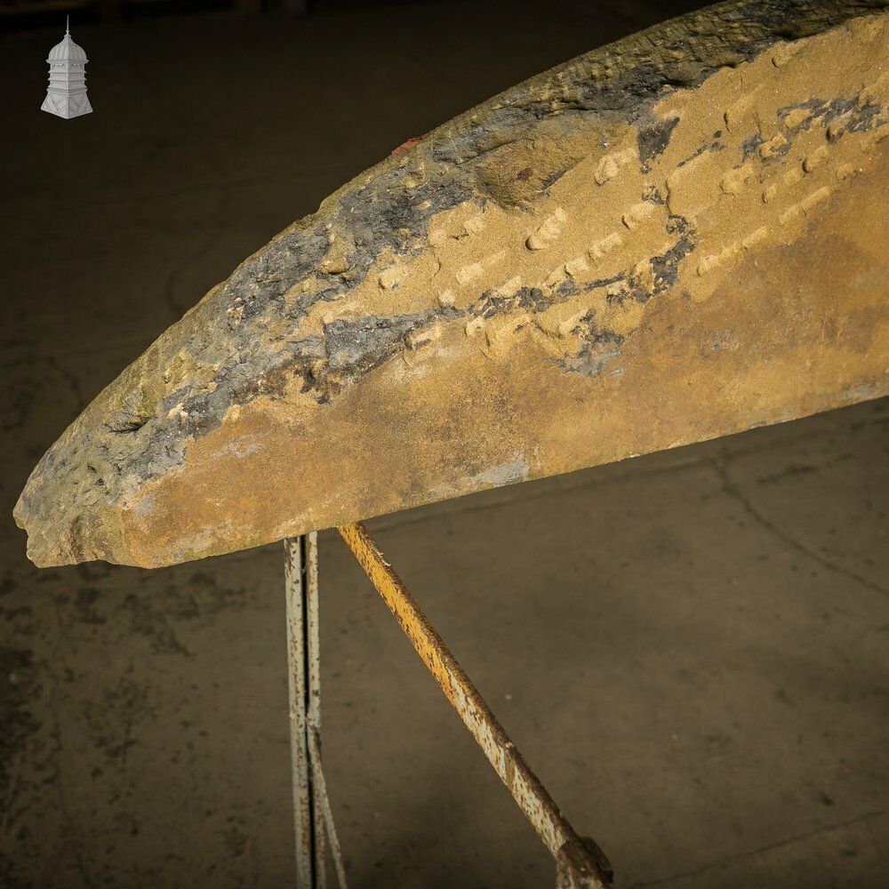 photo vintage Industrial Door Head, Carved Stone Arched Overdoor Sign