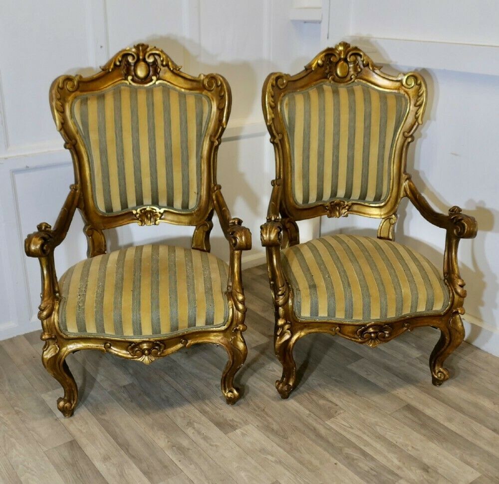 A Pair Of Large Italian Carved Giltwood Arm Chairs photo furniture