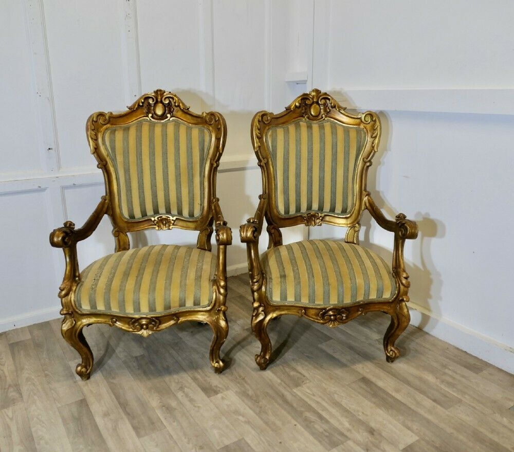 A Pair Of Large Italian Carved Giltwood Arm Chairs photo for sale