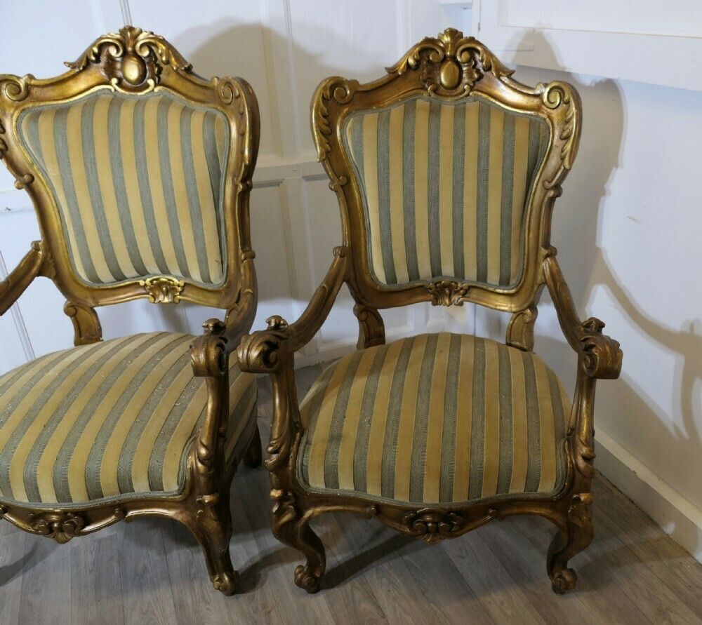 A Pair Of Large Italian Carved Giltwood Arm Chairs photo buy