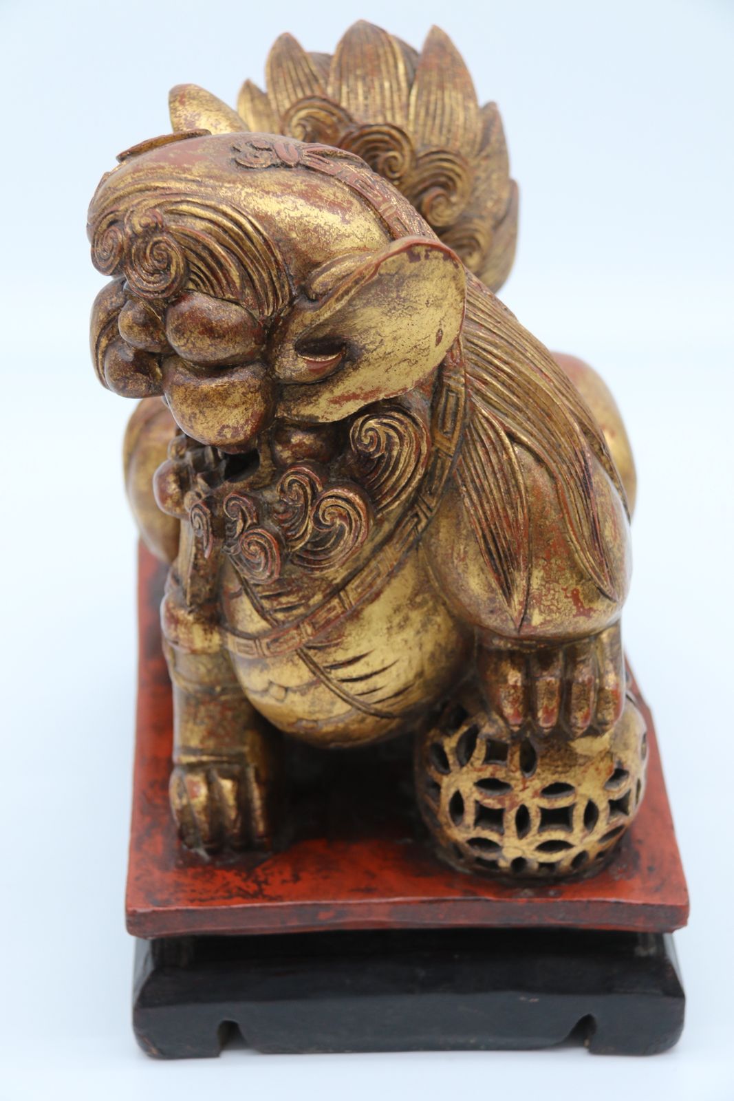 photo buy A Highly Decorative Pair Of Carved Gilt Wood And Lacquer Chinese Buddhist Lions Circa 1900