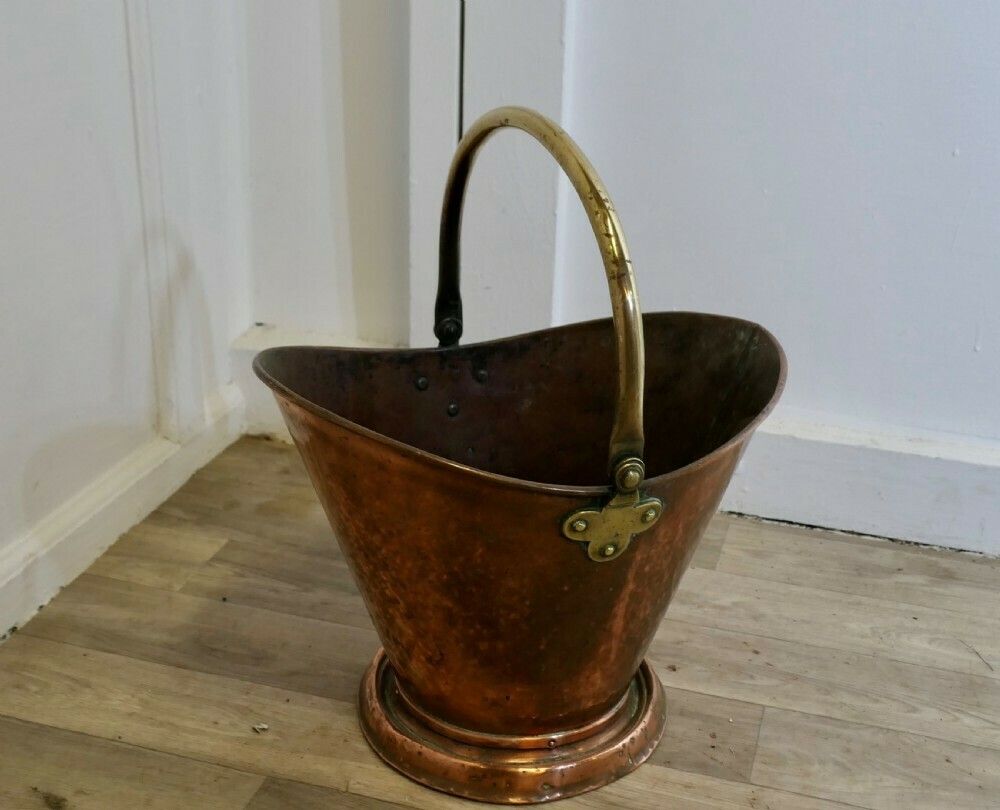 An Arts And Crafts Copper Helmet Coal Scuttle photo 570.0