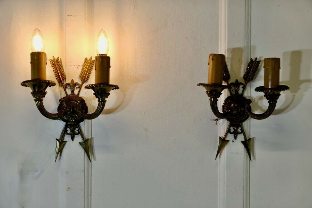 An Unusual Pair Of French Brass Twin Wall Lights, With Arrows