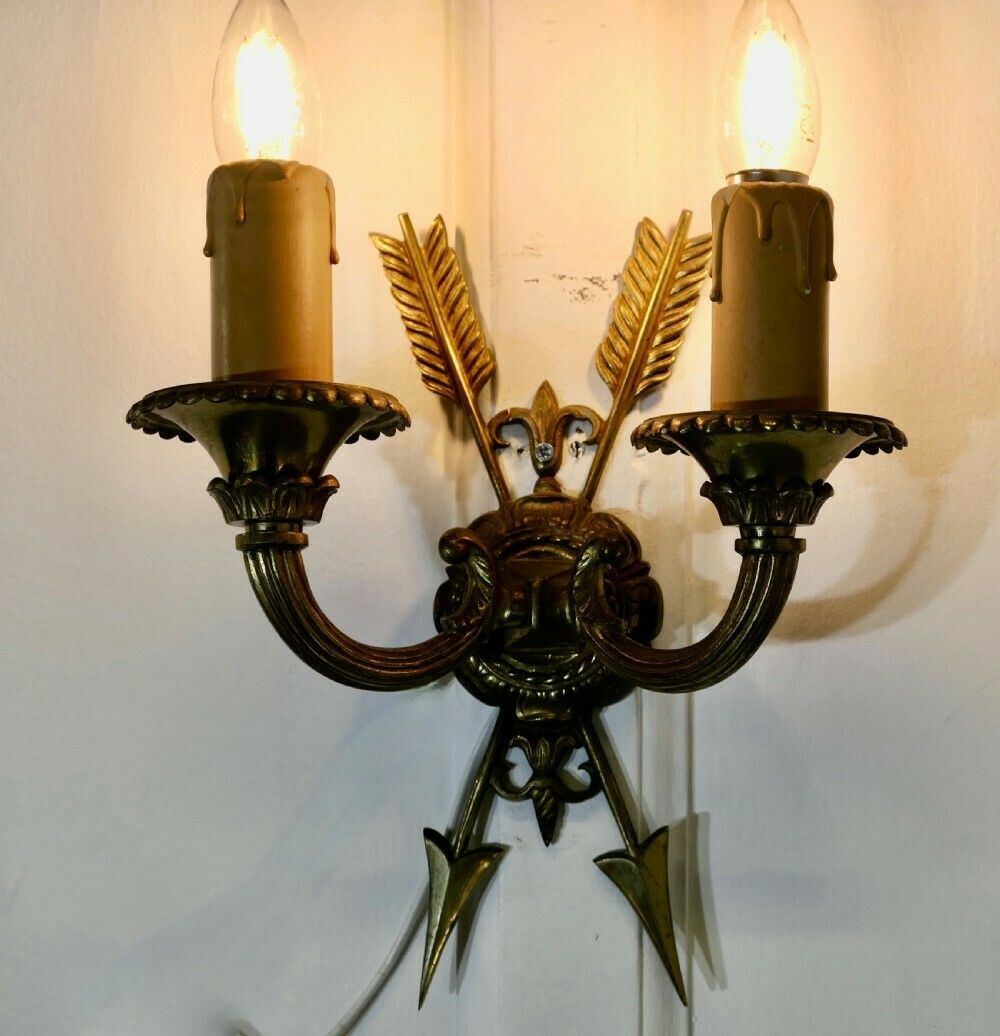An Unusual Pair Of French Brass Twin Wall Lights, With Arrows photo for sale