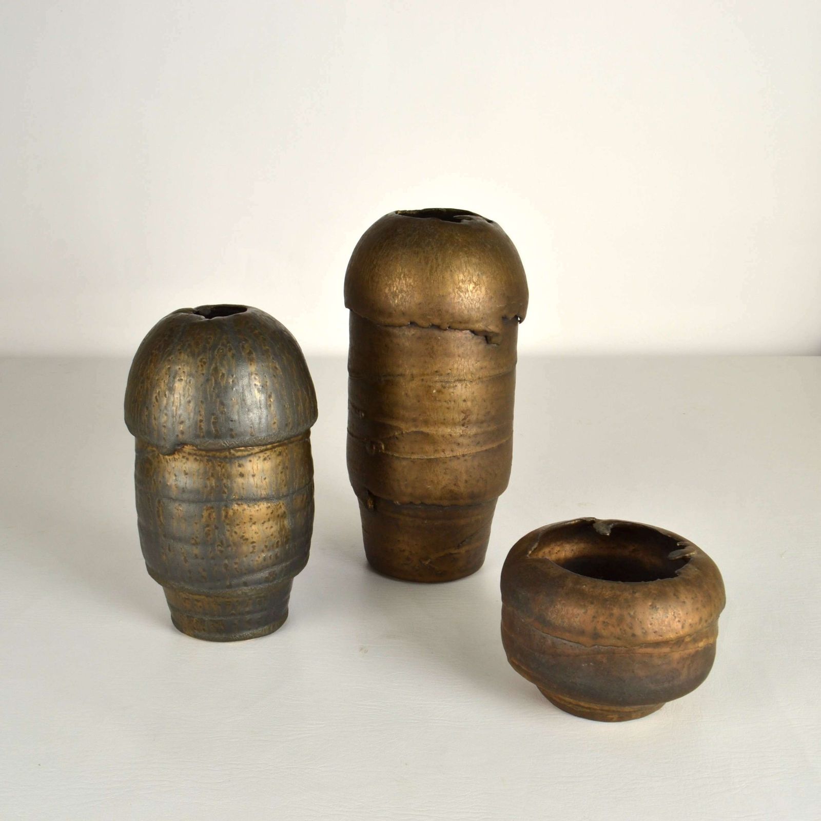 photo for sale Group Of Bronze Ceramic Vases By Jaan Mobach