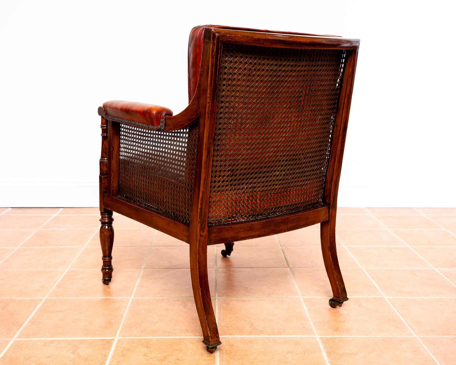 5750.0 Fine Regency Bergere Leather Library Chair 1810 1820 Georgian Reading Red Leather Armchair Carved Cane Rattan Brass Castors photo