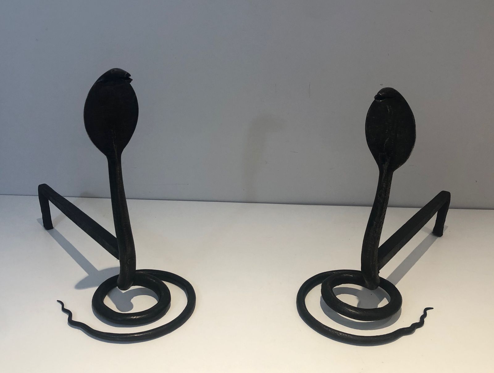 photo for sale Pair Of Wrought Iron Cobra Andirons In The Style Of Edgar Brandt
