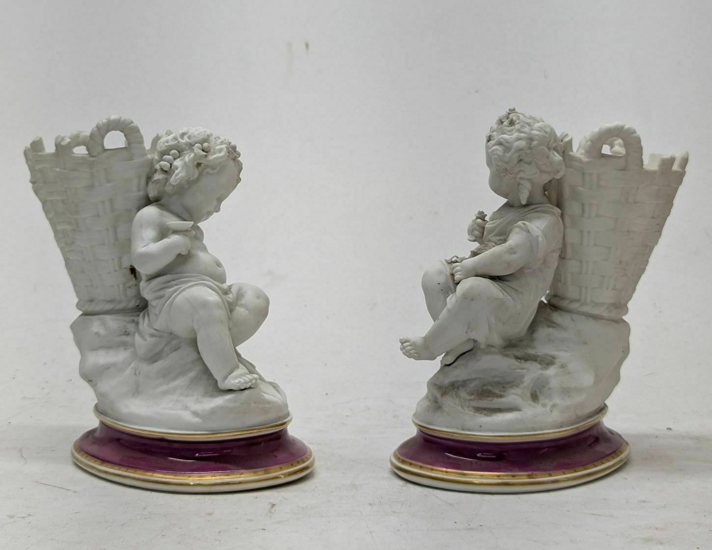 Pair Of Young Boy Biscuit Flower Girls photo vinterior
