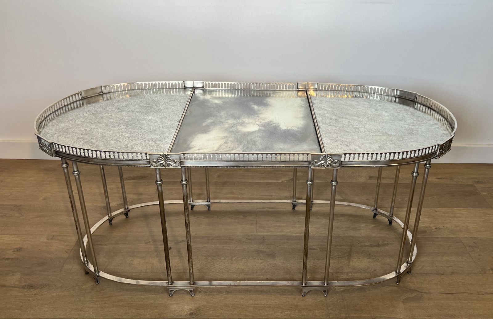 Neoclassical Style Coffee Table In Silver Metal And Aged Mirror Tops photo for sale