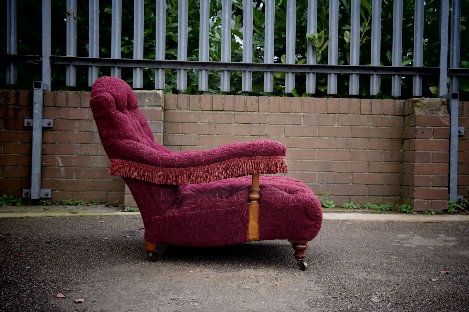 photo furniture A Howard & Sons Buttoned Open Armchair In Heavy Burgundy Fabric