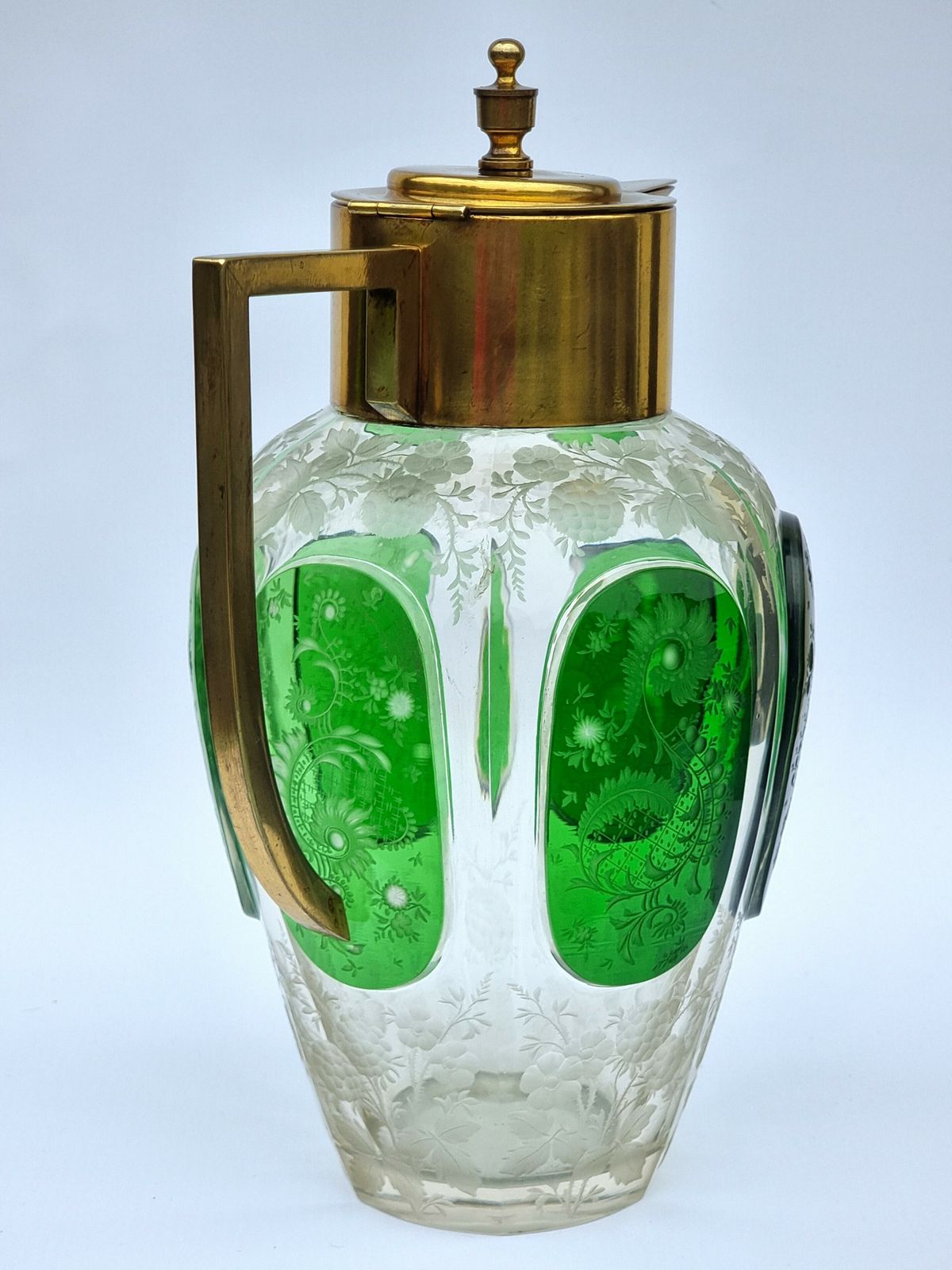 photo vintage 19th Century Bohemian Glass Claret Jug With Finely Cut Green Glass Panels Circa 1890