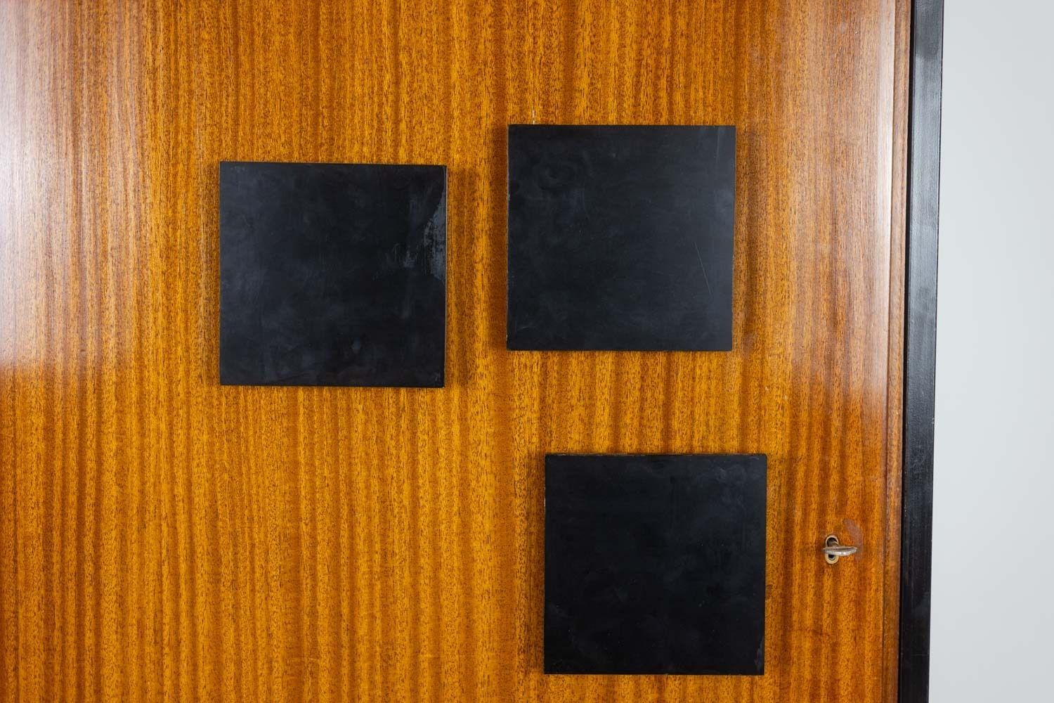 photo buy Pair Of Cabinets In Mahogany Veneer And Black Lacquered Iron. 1950s.