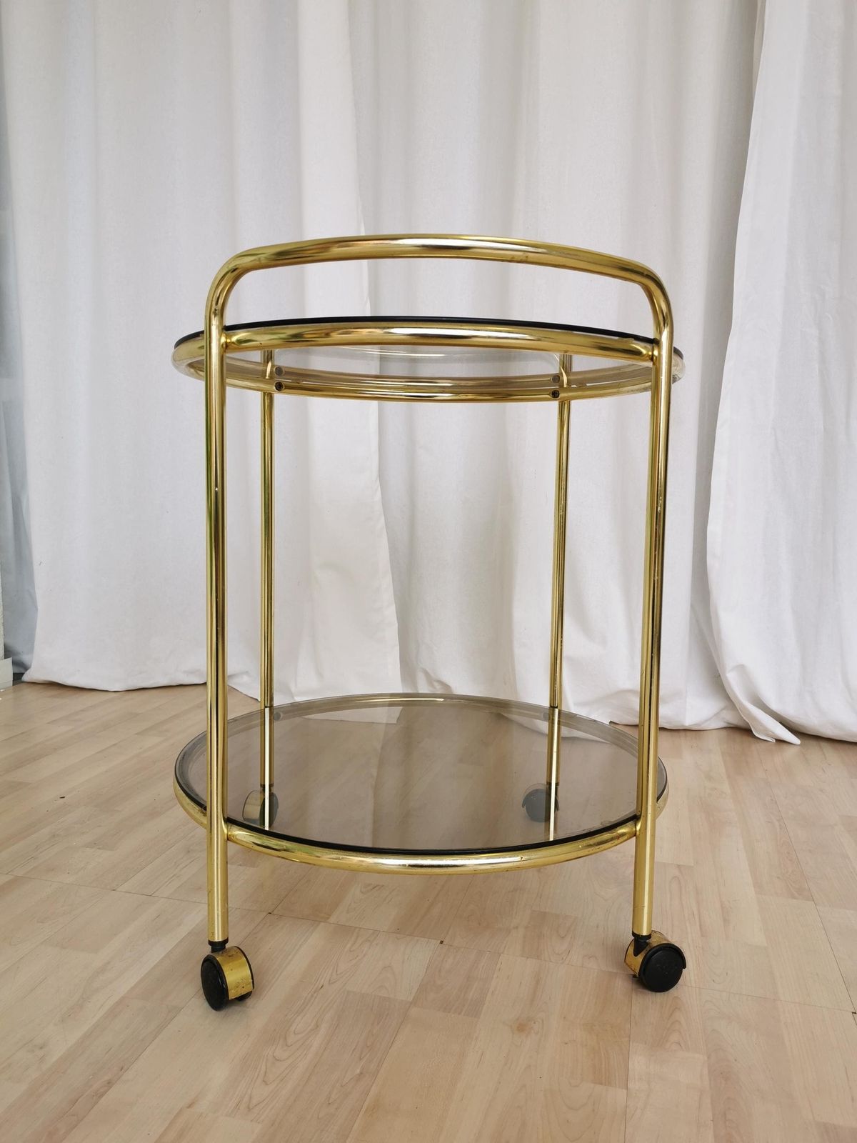 Vintage Serving Trolley With Metal And Smoked Glass / 1970s Mid Century Golden Rolling Side Table / Hollywood Regency Bar On Wheels photo for sale