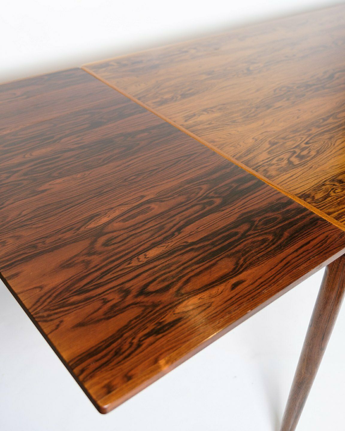photo furniture Dining Table With Extension In Rosewood By Johannes Andersen  For Chr. Linnebergs Møbelfabrik From 1960s