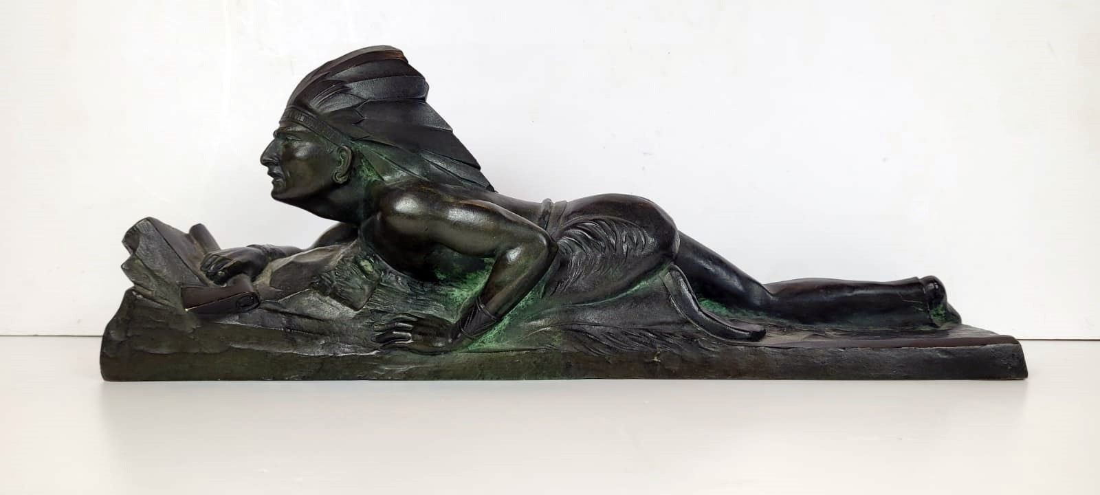 Art Deco Bronze Sculpture With Green Patina Representing An Indian On The Lookout. Signed E.Guy For Edouard Guy Du Passage (1872   1925)   France