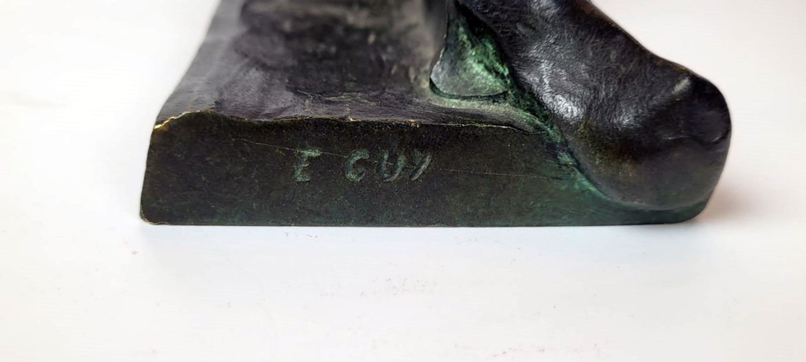 Art Deco Bronze Sculpture With Green Patina Representing An Indian On The Lookout. Signed E.Guy For Edouard Guy Du Passage (1872   1925)   France photo vintage