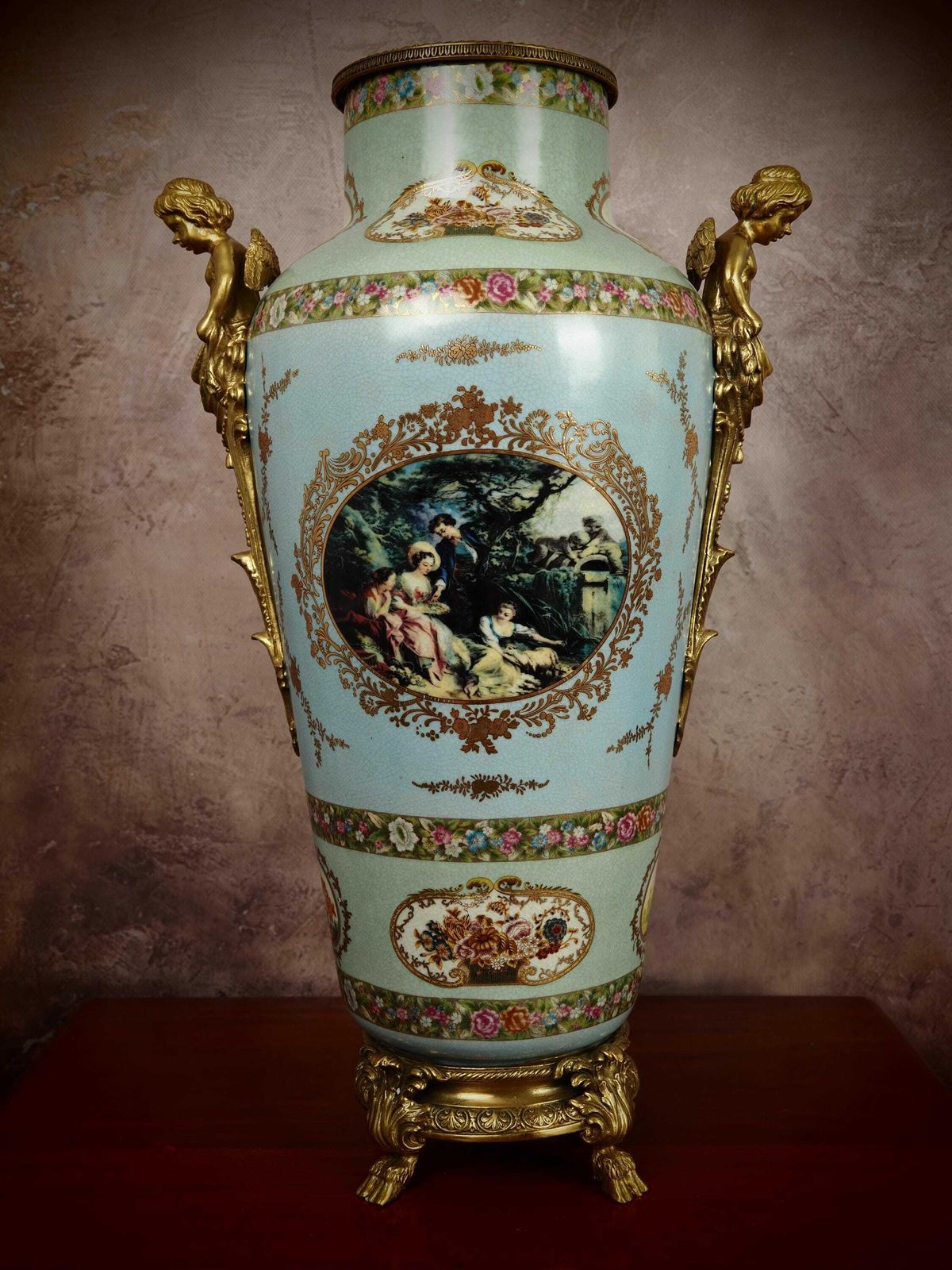 Elegant Porcelain And Bronze Vase With Angel Motifs   A Timeless Addition To Your Decor photo furniture