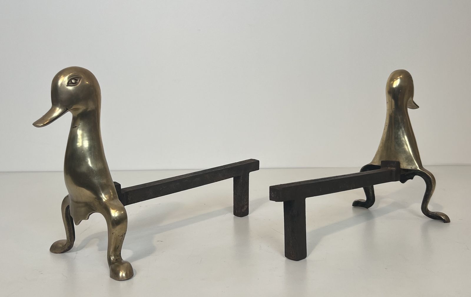 Pair Of Andirons Representing Stylized Ducks In Brass In The Style Of Claude And François Xavier Lalanne. Circa 1970 photo Home Fixtures
