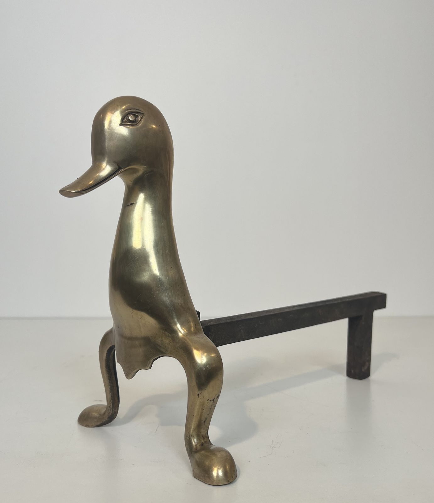 Pair Of Andirons Representing Stylized Ducks In Brass In The Style Of Claude And François Xavier Lalanne. Circa 1970 photo vintage