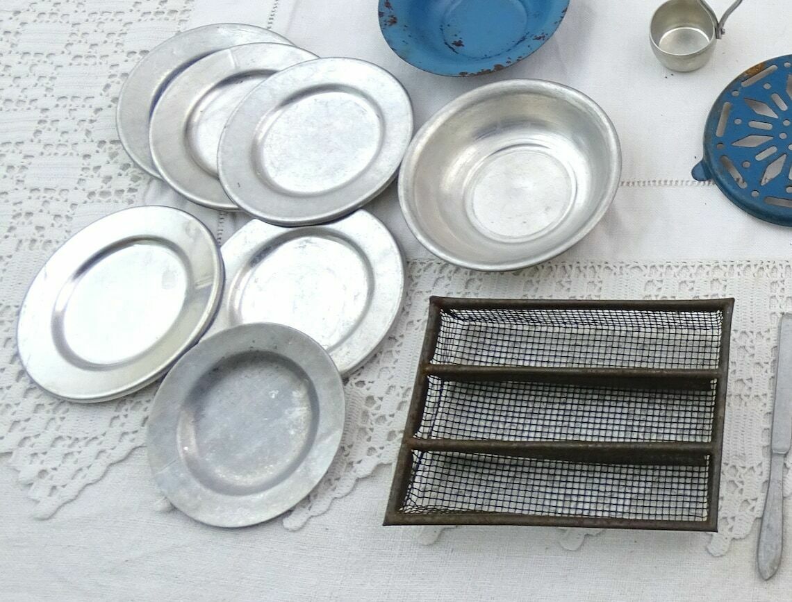 Vintage French Dolls Play Dinner Set With Enamel Trivet, Cutlery And Cast Iron Cooking Pot, Retro Childs Pretend Kitchen Toys, Kids Playing photo vintage