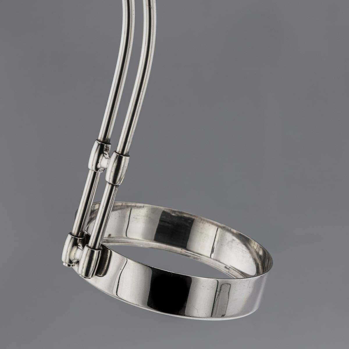 photo furniture 20th Century American Art Deco Cartier Solid Silver Wine Bottle Holder C.1920