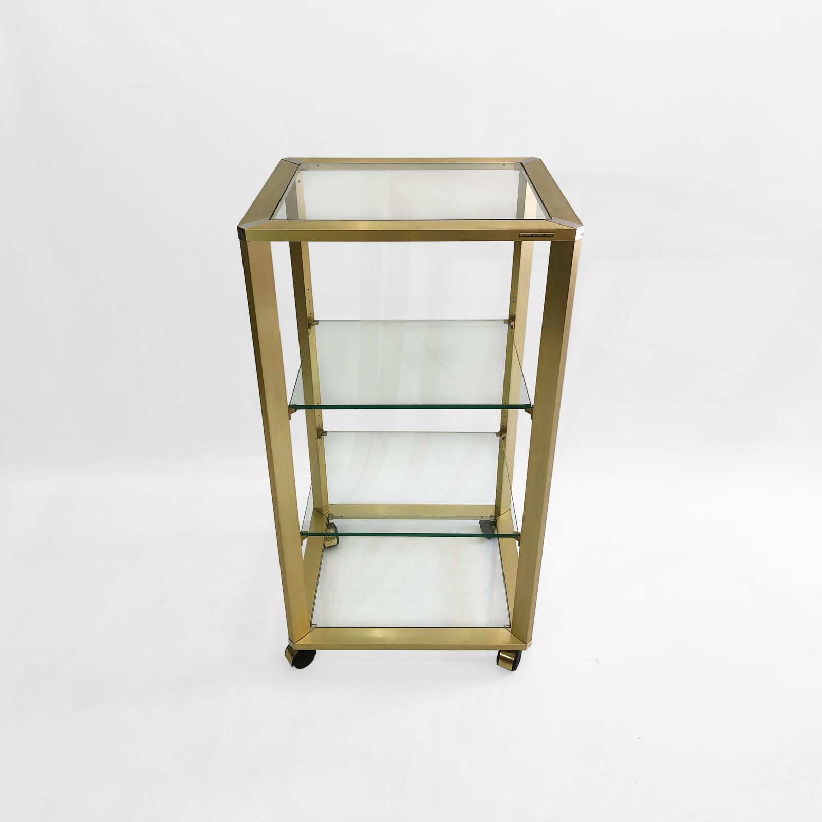 photo vinterior Pierre Vandel Gold Glass Etagere On Wheels 1970s Mid Century Hollywood Regency Shelving Trolley Drinks Cart