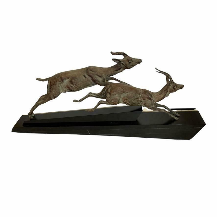 1920's French Bronze Sculpture Of Two Antelope On A Black And Green Onyx Base photo furniture