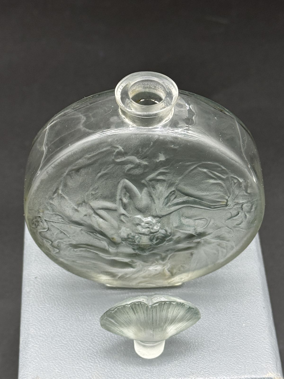 A René Lalique Rosaces Figurines Perfume Bottle. photo furniture