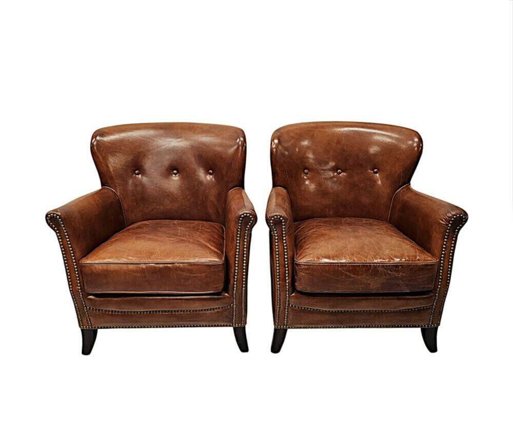 A Stunning Pair Of Small Leather Club Armchairs In The Art Deco Style photo for sale