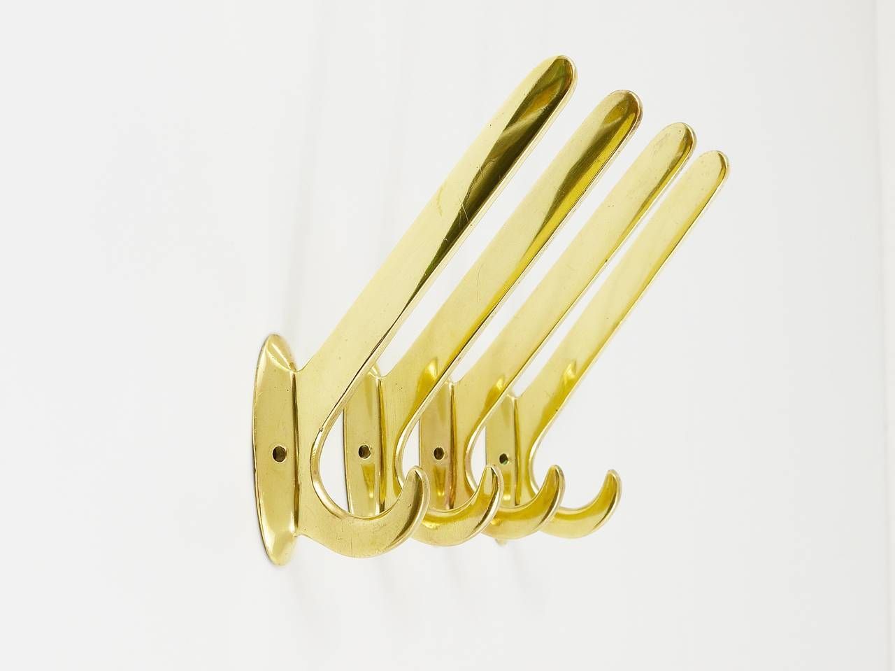photo furniture Four Art Nouveau Handmade Brass Wall Hooks, Austria, 1920s