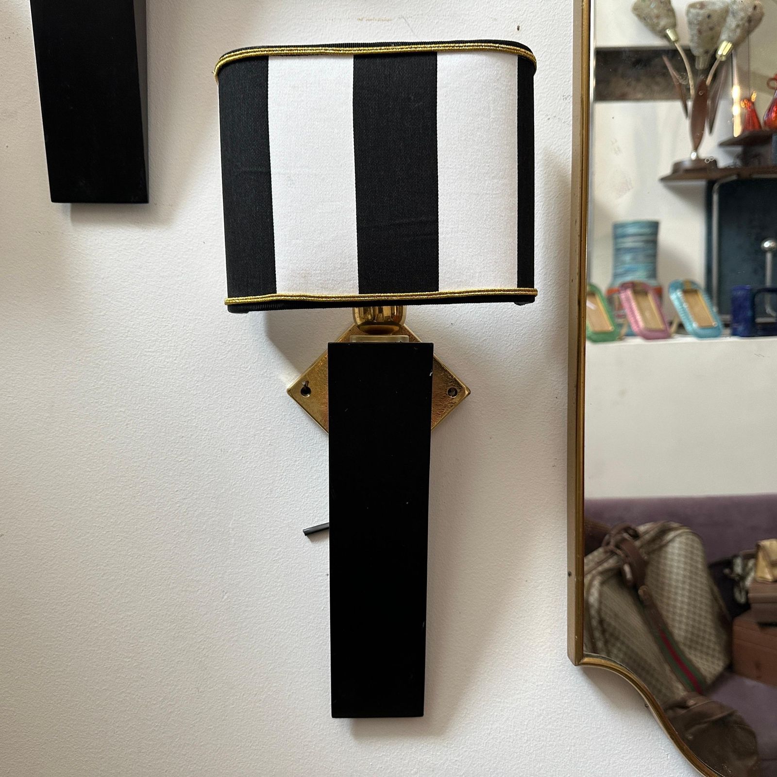 An Elegant 1980s Art Deco Style Black Painted Wood And Brass Italian Wall Sconce photo for sale