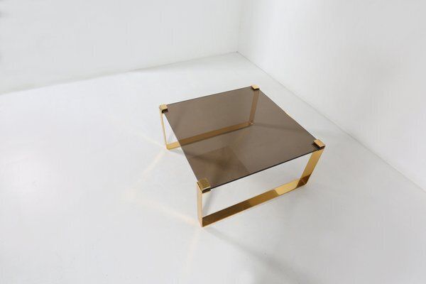 Mid Century Modern Coffee Table With Gold Plated Base And Glass Top, 1970s photo vintage