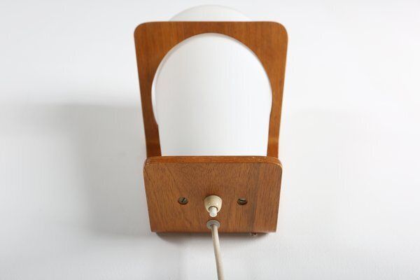 photo furniture Wall Lamp In Curved Teak Plywood By Louis Kalff For Philips, 1959
