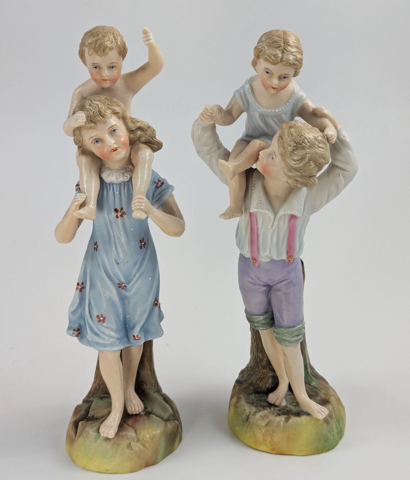 Ernst Bohne & Söhne Figurines: Boy & Girl Holding Children, C. 1887