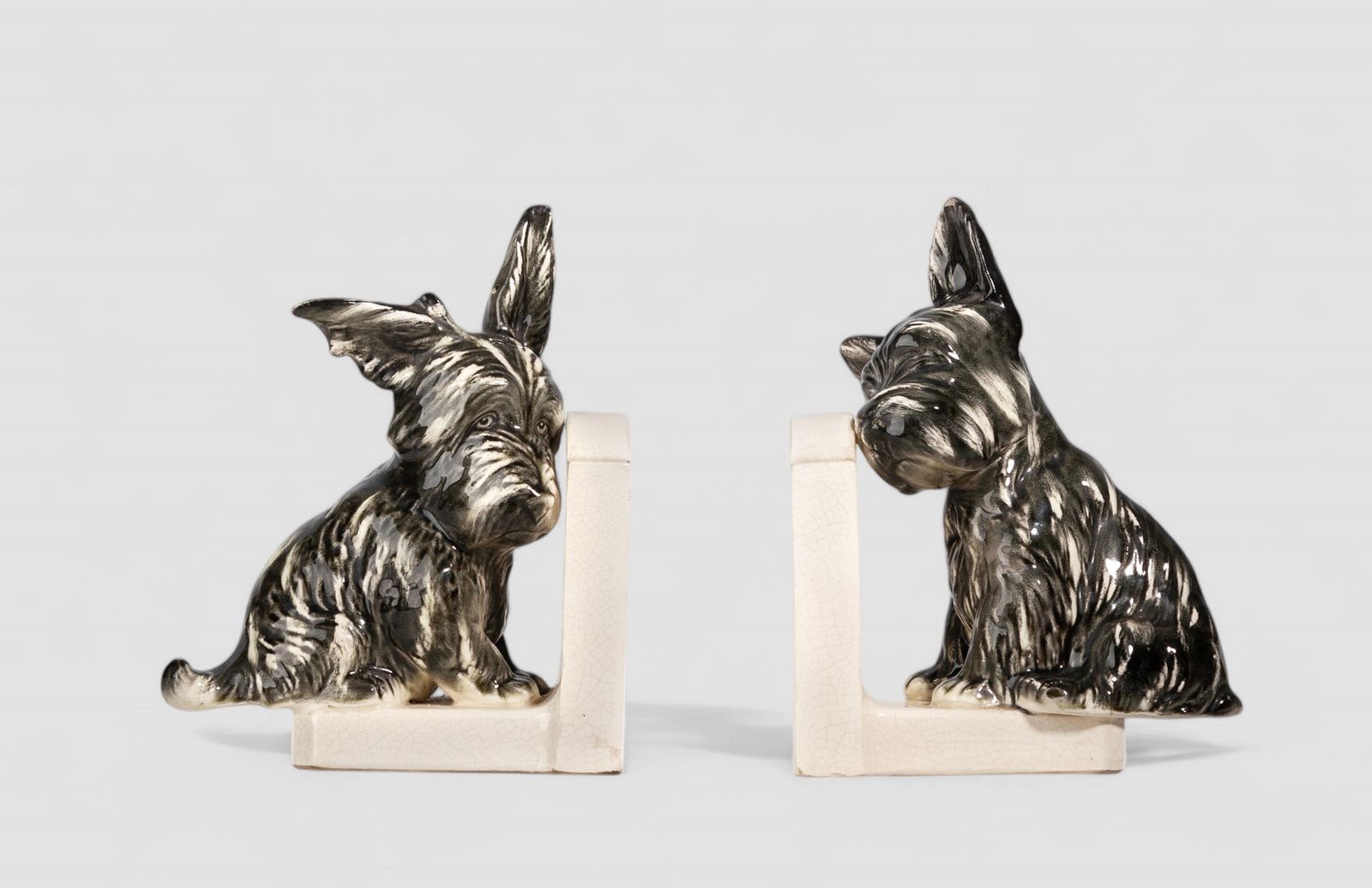 Pair Of French Art Déco Painted Ceramic Bookends Shaped Like Scotch Terrier Dogs