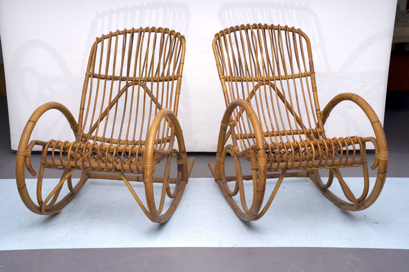 Franco Albini Style, Pair Of Rattan And Bamboo Rocking Chairs. Italy 1950s