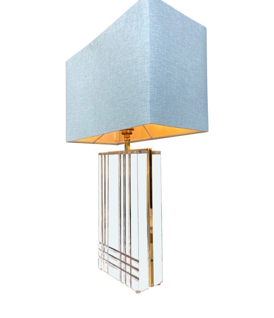 photo buy A Pair Of 1970s Italian Gilt Metal And Lucite Lamps