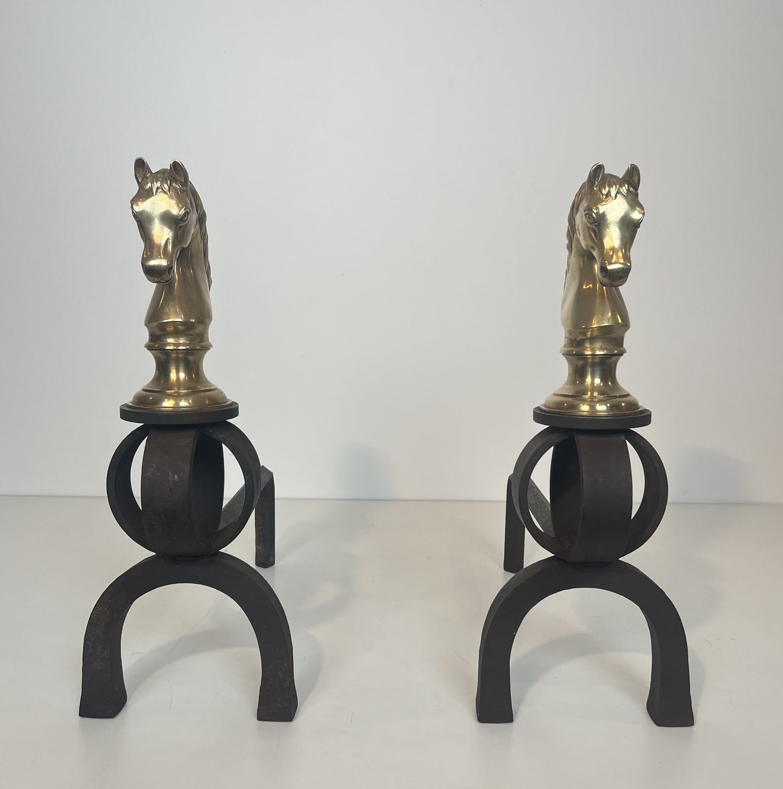 Important Pair Of Bronze And Wrought Iron Andirons Representing Horses' Heads photo for sale