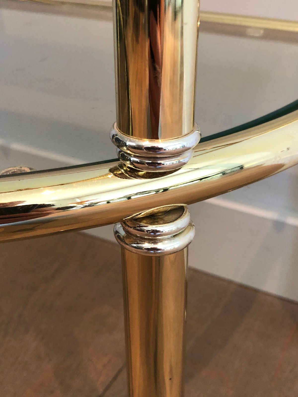 photo furniture Pair Of Rounded Brass And Silver Metal Sofa End Tables