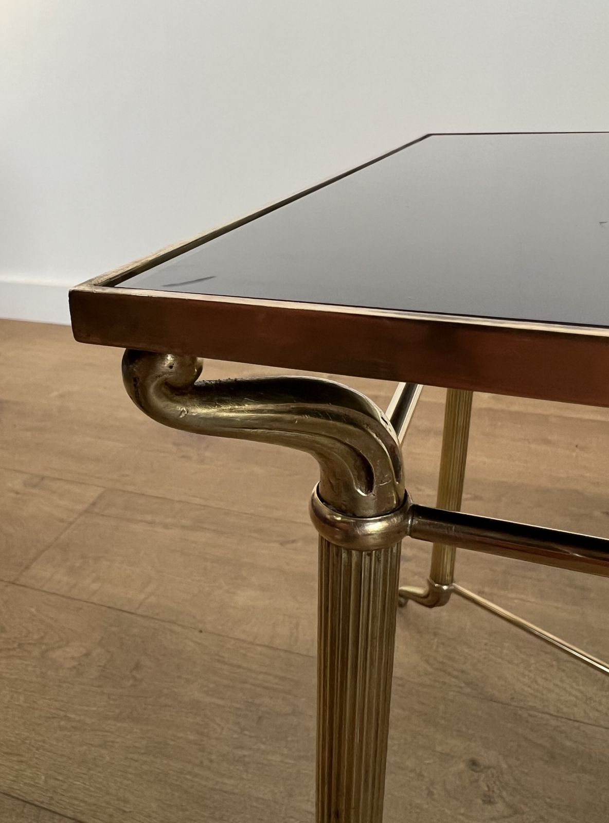 photo vintage Coffee Table In Brass And Black Lacquered Glass In The Style Of Maison Jansen
