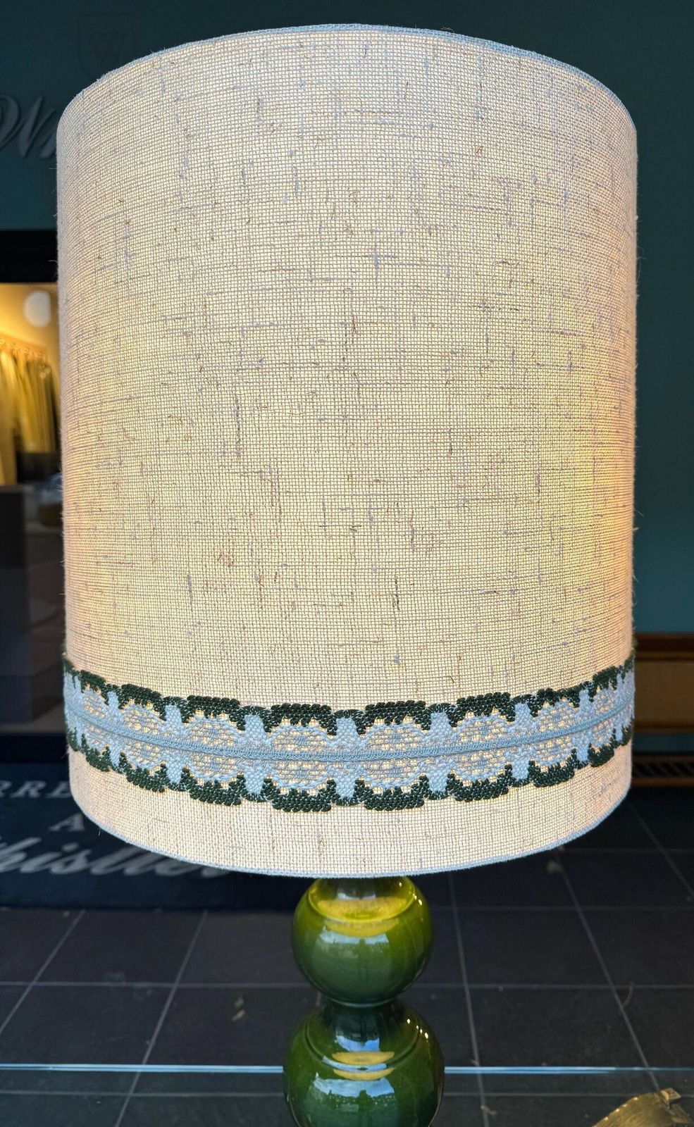 photo vintage A Large French 1960s Green Glazed Ceramic Lamp With Original Hessian Shade