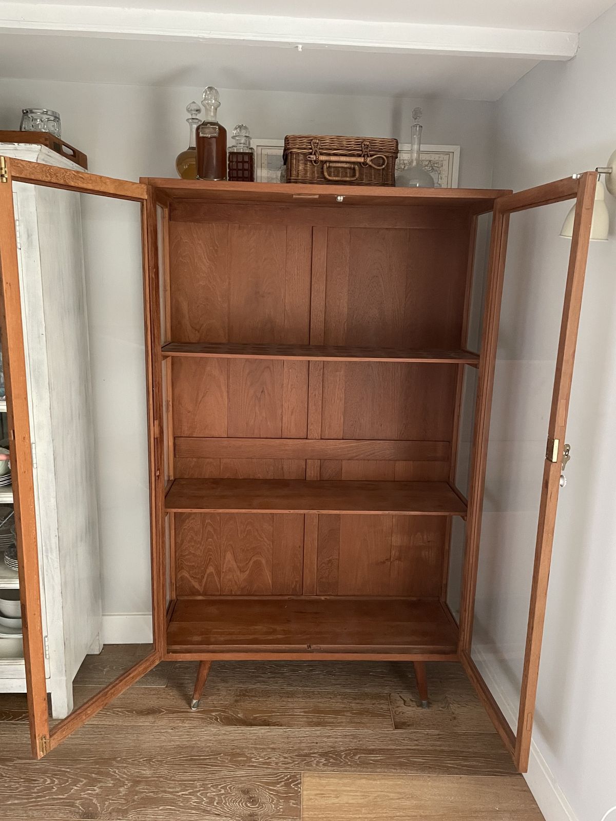 1960s Teak Glass Cabinet With Brass Capped Feet photo for sale