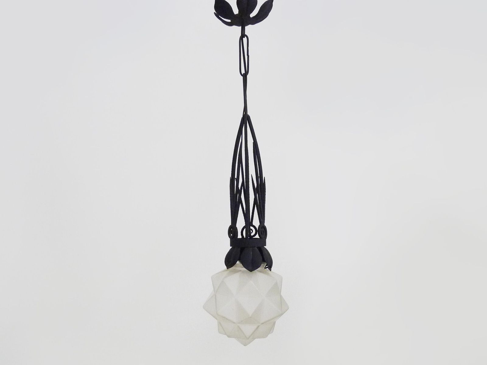 Chandelier, Art Deco Pendant Light In Wrought Iron And Star Globe In Glass Paste. 1930s photo 345.0