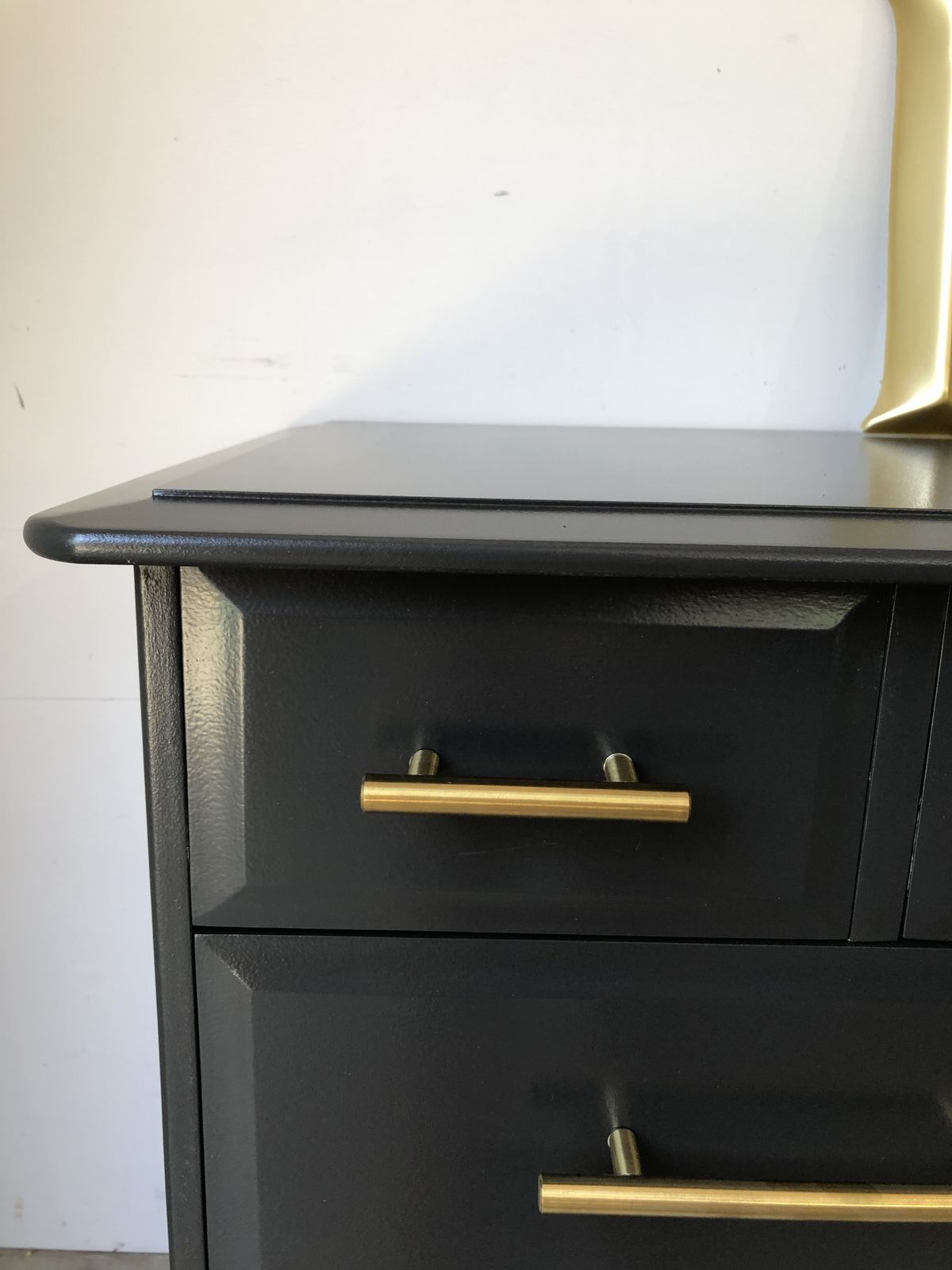 photo furniture Stag Minstrel Chest Of Drawers Painted Black Gold Pulls