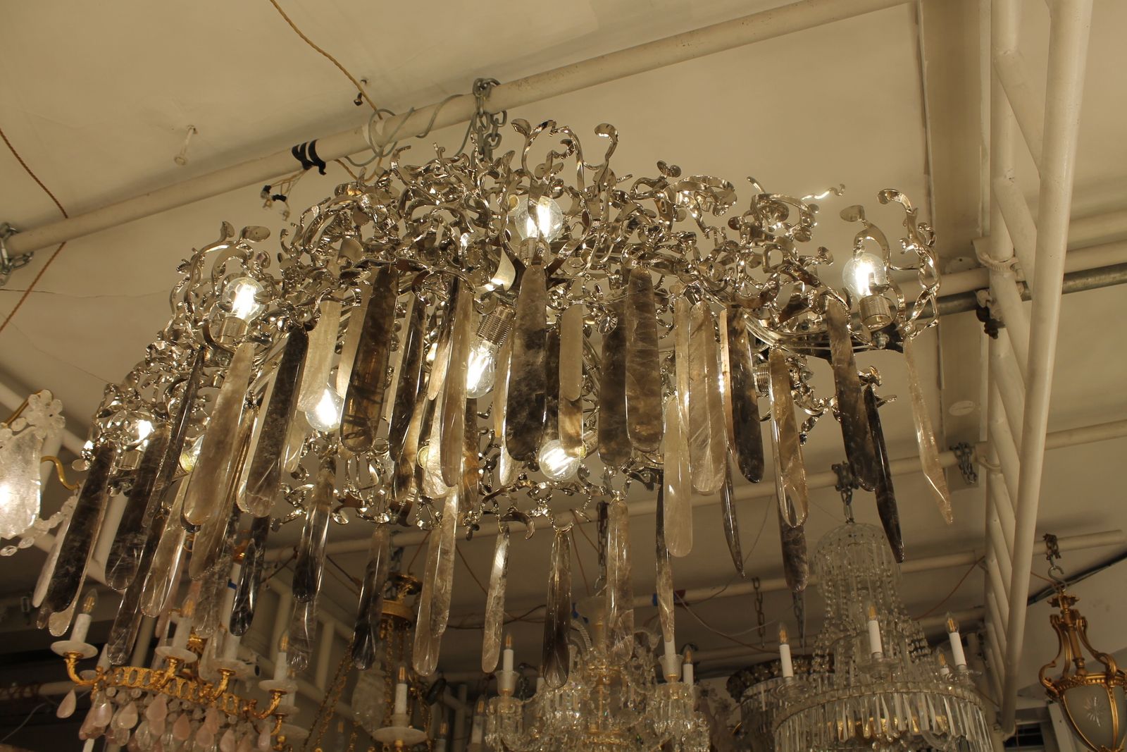 A Unique Hand Made Chandelier In Nickel Steel, Smoked & Clear Rock Crystal photo furniture