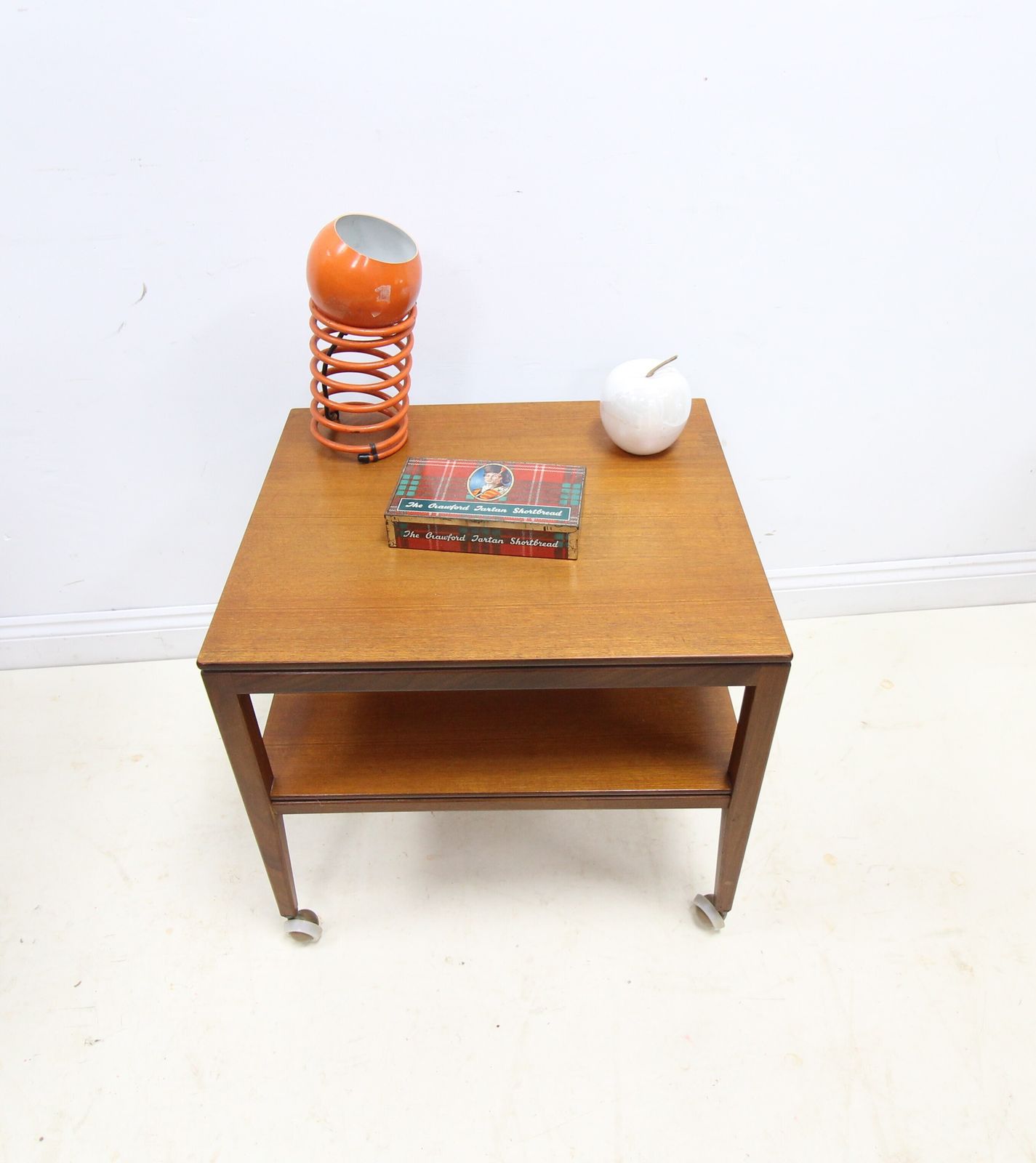 Mid Century Danish Style 2 Tier Teak Side Table On Castors