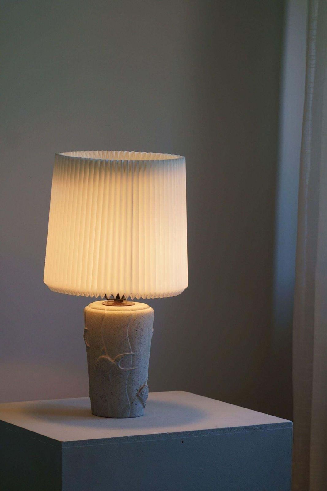French Modern, A Vintage Table Lamp In Stone With Fish Motifs, 1970s photo vintage