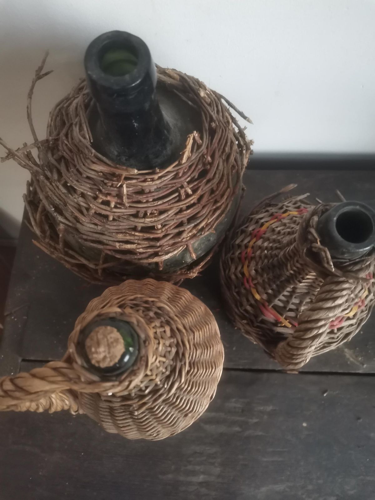 photo furniture Set Of 3 Weaved Wicker Wine Bottles Demijohn Antique Primitive, Hand Made. Decorative Rustic 100 Yrs Old Garden Decor Hand Blown Glass